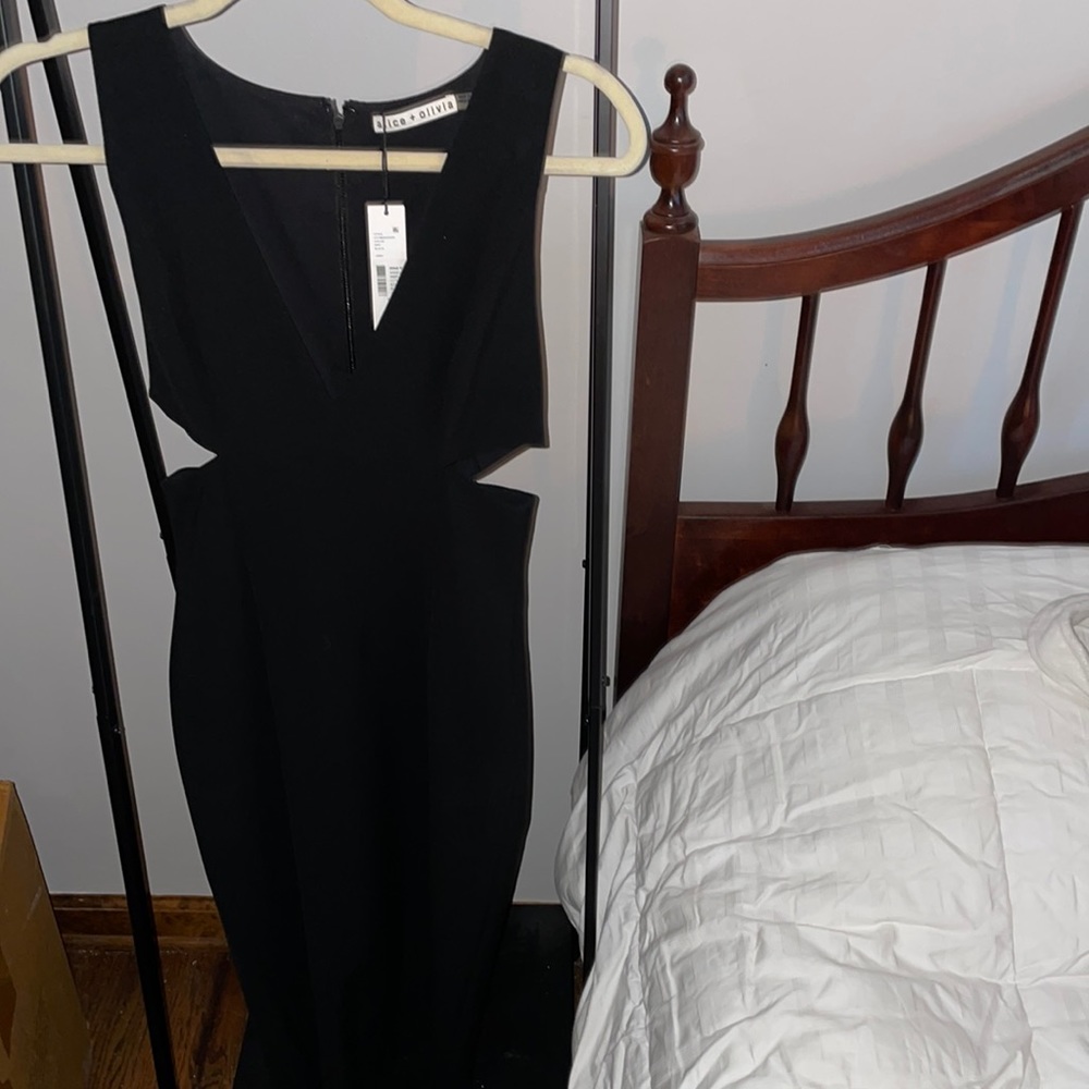 Alice and Olivia black dress with side cut outs, never worn, tags on size 2